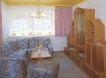 Wohnzimmer - Pension - Ferienhaeuser Waldruh - Tannenheim - Inge Faaker See