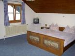 Ferienhof Oberer Riesner Doppelzimmer See- und Bergblick 1 Bild