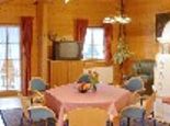 Bio Raum mit Kachelofen - 4* Sterne Bio-Holzhaus Heimat aus Tannenholz Ramsau am Dachstein