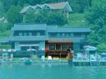Ferienwohnungen Mistelbauer ****  FeWo 1 200x175 - Ferienwohnungen Mistelbauer **** Faaker See