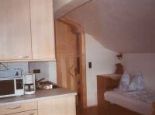 Big living kitchen with table, couch and kitchen - Biobauernhof 