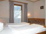 Schlafzimmer in der Ferienwohnung C - Appartement Laerchenwiese Maurach am Achensee