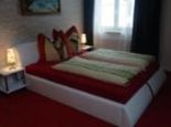 Schlafzimmer mit freistehender Badewanne - Apartment Fernerkogel Gries im Sellrain