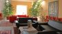 hotellobby 's zomers - Dachhotel ATRIGON**** in Klagenfurt Klagenfurt