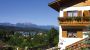 Blick auf den See mit Teil vom Haus - Gaestehaus ERIKA Poertschach am Woerthersee
