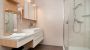 Bad der Hotelzimmer Panorama und Premium - Erlebnis-Hotel Appartements  Wellness & Sport Faaker See