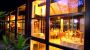 buitenaanzicht 's zomers - Appartements & Familienhotel Elisabeth **** Poertschach am Woerthersee