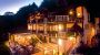 buitenaanzicht 's zomers - Appartements & Familienhotel Elisabeth **** Poertschach am Woerthersee