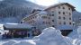 Landhotel Tirolerhof Winter - Nordansicht mit Skilift - Das Landhotel & Vital TIROLERHOF Wildschoenau