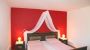 Bedroom, example - Appartementhaus Edelweiss Gosau