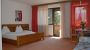 Stanze  in estate, camera Mehrbettzimmer mit Balkon - Bio Landhotel Anna Silandro
