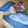 Schlafzimmer in einem 10-Personen-Blockhaus